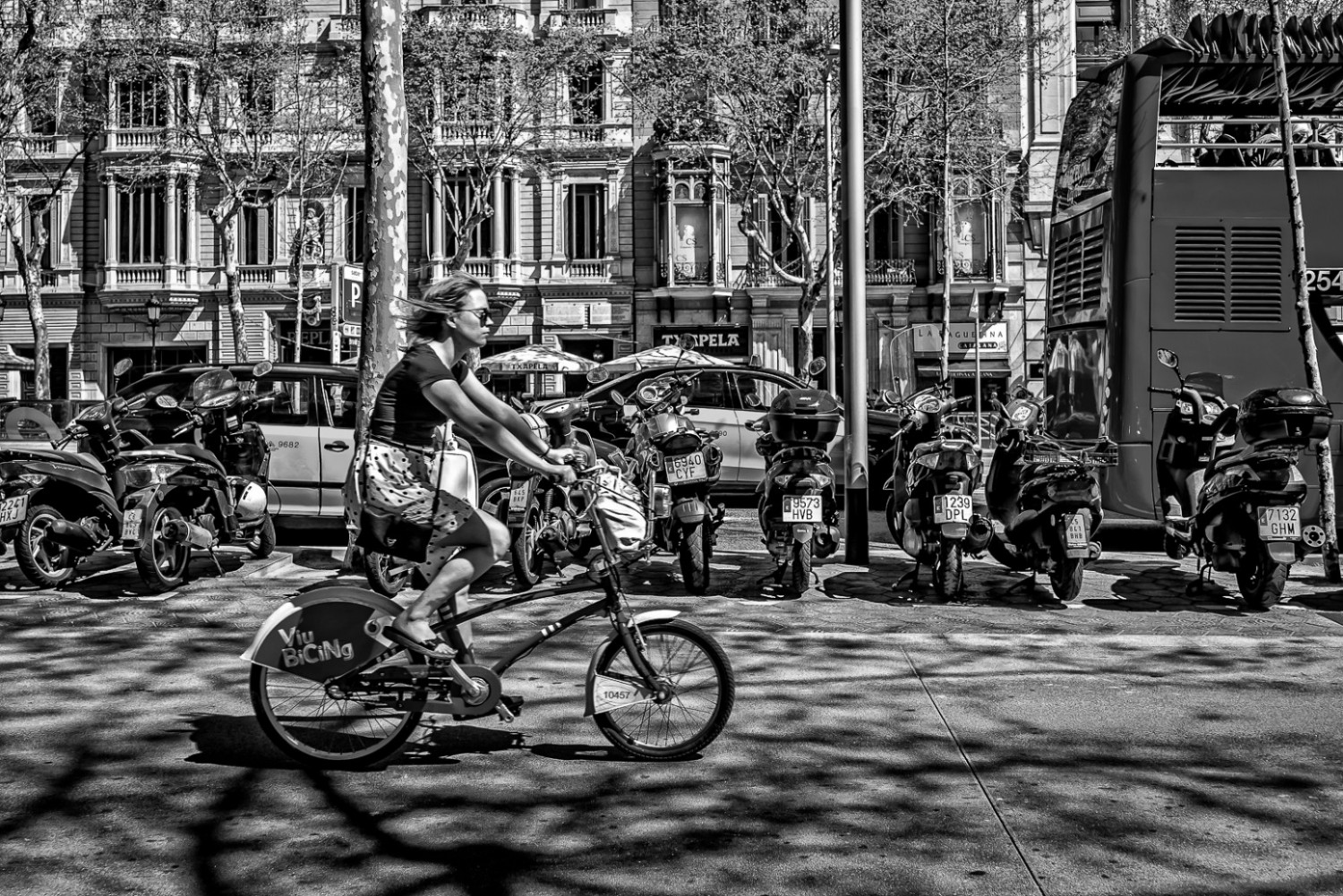 Girl on bike. Barcelona